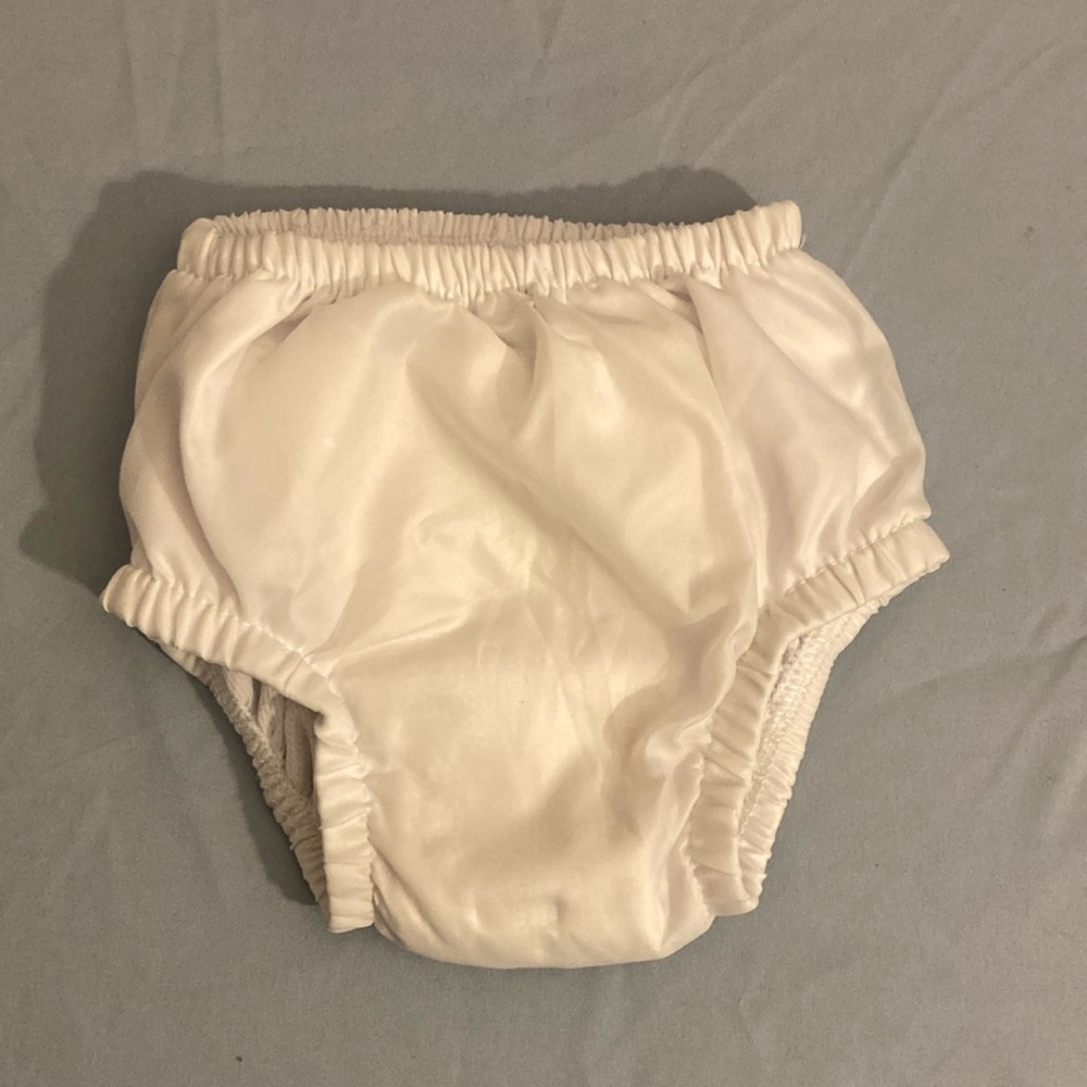 Brand new never worn I play. Swim diaper